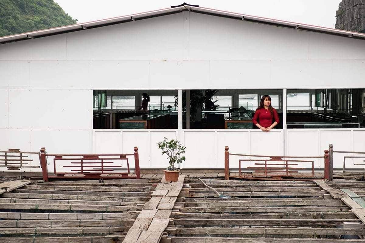 Woman Akoya Pearl Farm shop waits customers Halong Bay Vietnam