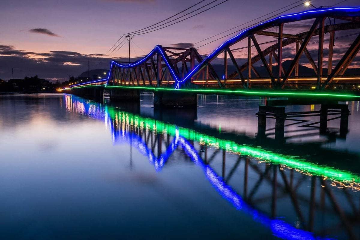 Old French bridge Kampot River dusk Cambodia