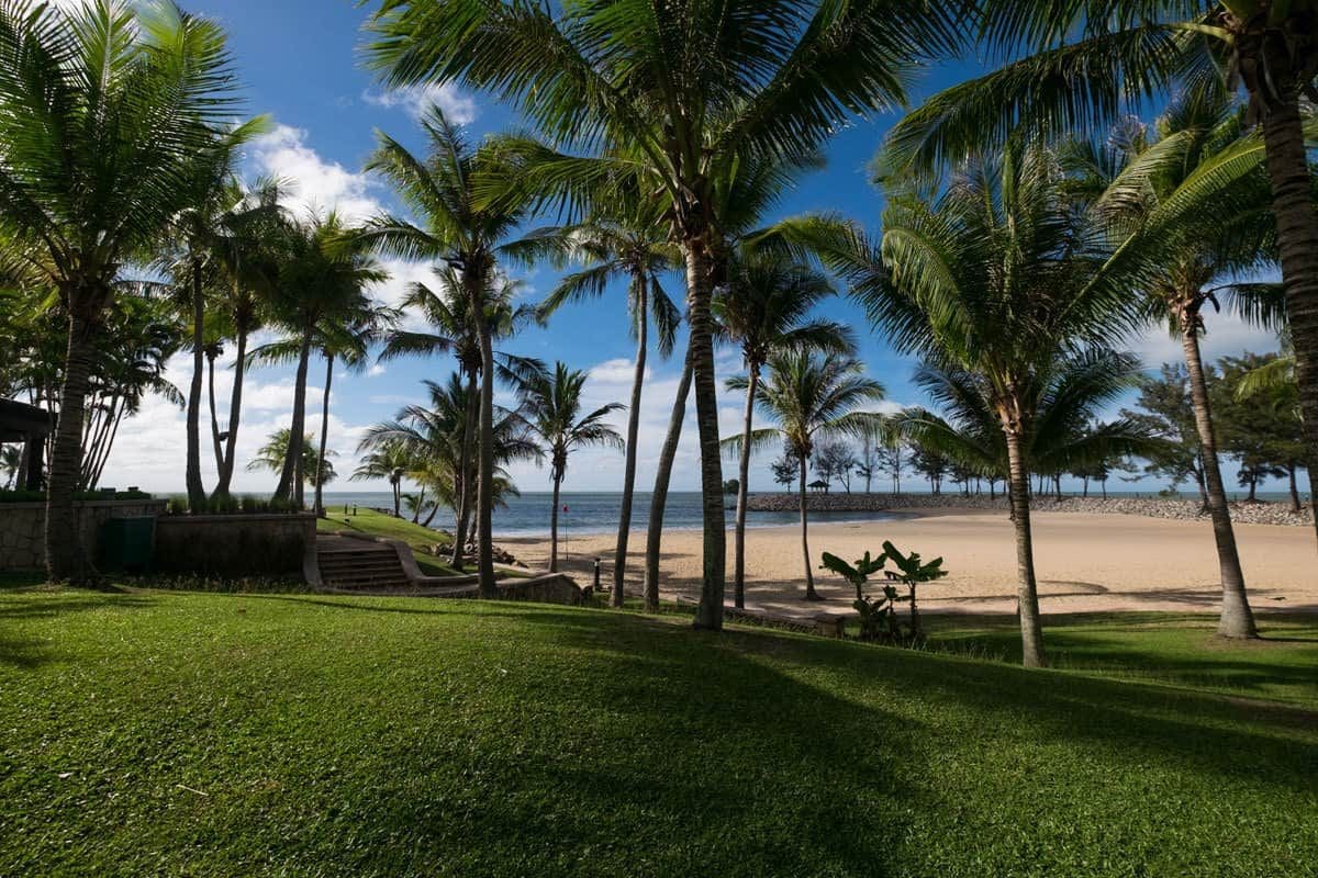 View of the garden and beach of the Empire Hotel and Country Club. Jerudong, Brunei.