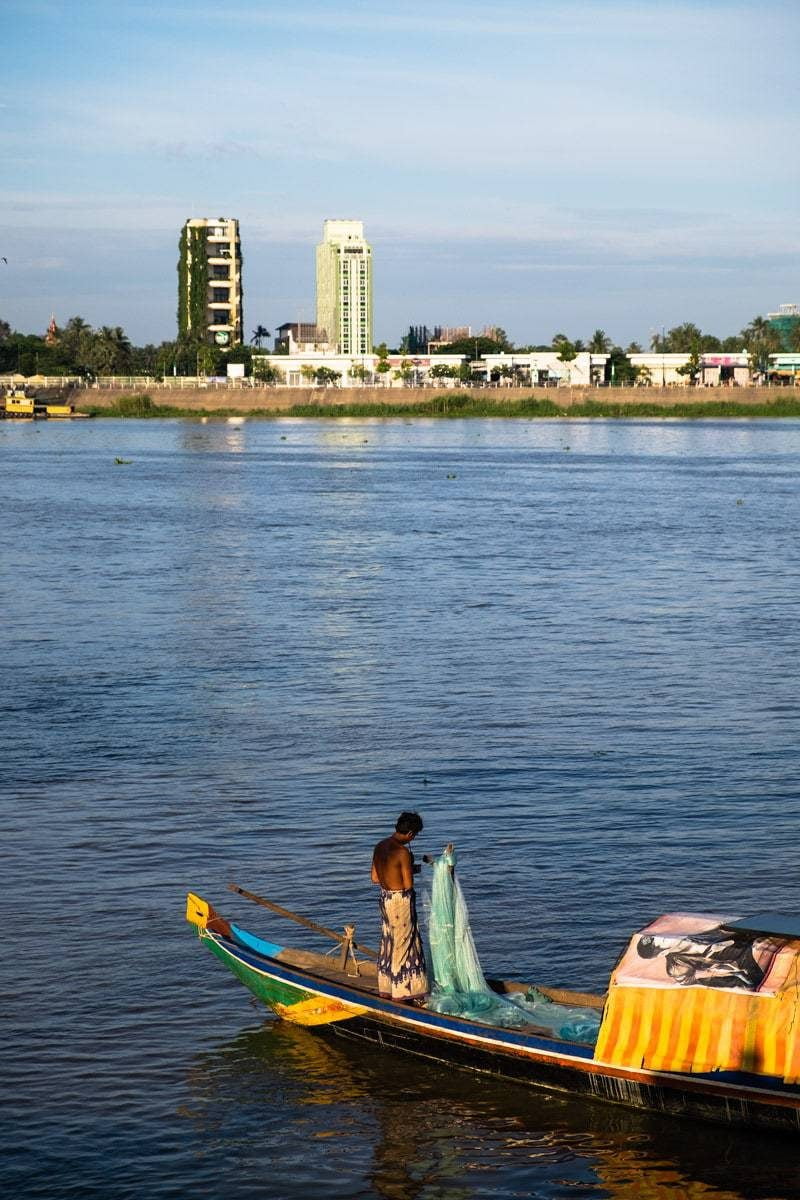 Khmer fisherman gets ready for fishing at Tonlesap River. Phnom Penh, Cambodia.