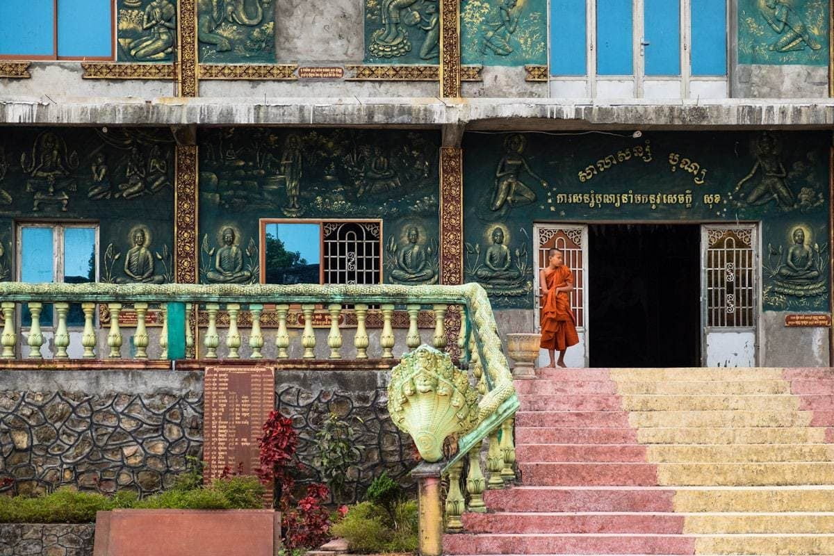 Monk novice at Wat Sampov Pram Pagoda. Bokor Hill. Kampot, Cambodia.