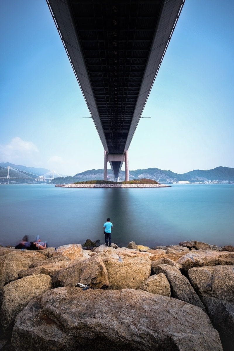 Fishing under the Tsing Ma Bridge. Ma Wan Island, Hong Kong.