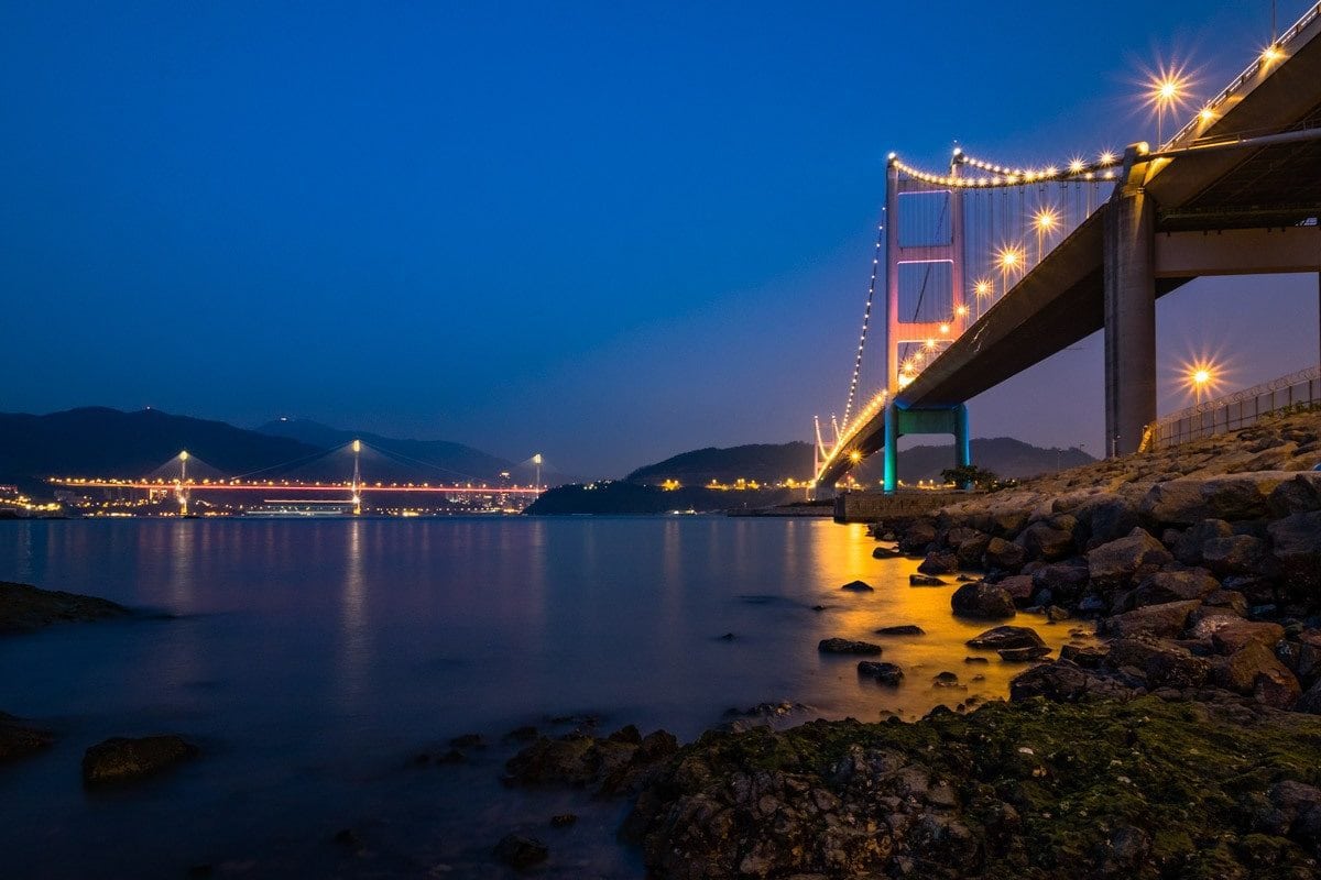 Tsing Ma Bridge by night. Ma Wan Island, Hong Kong.