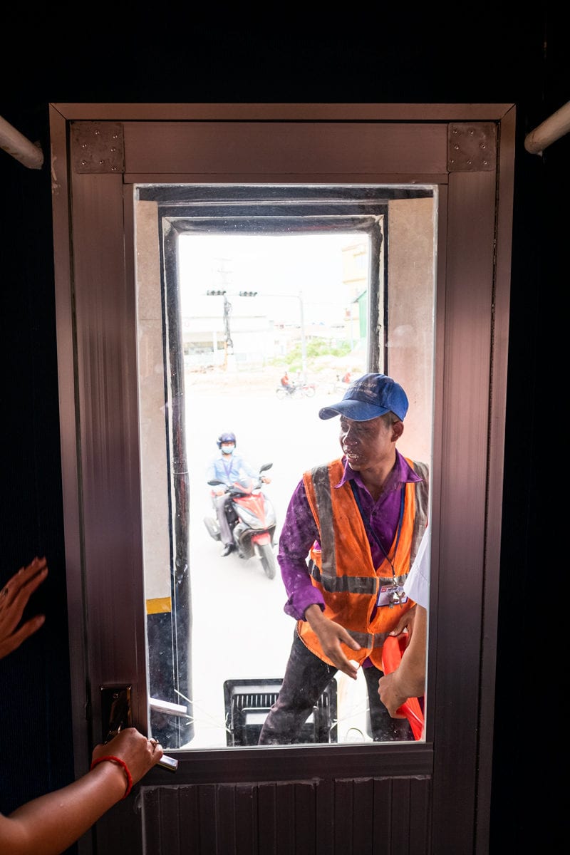 At the back of the train from Phnom Penh Railway Station to Phnom Penh International Airport. Cambodia.