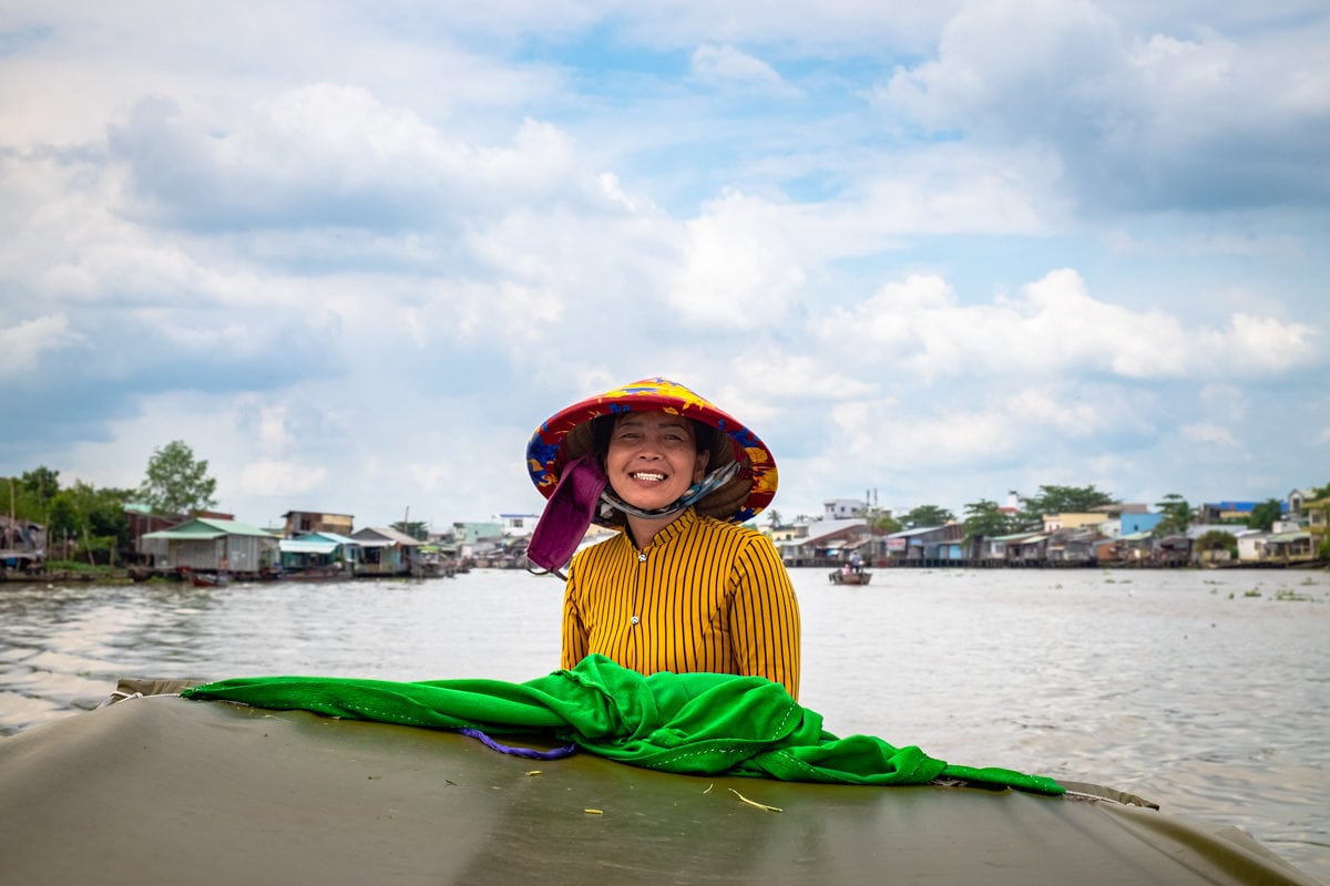 Smiling Vietnamese woman on her boat. Mekong Delta. Can Tho, Vietnam.