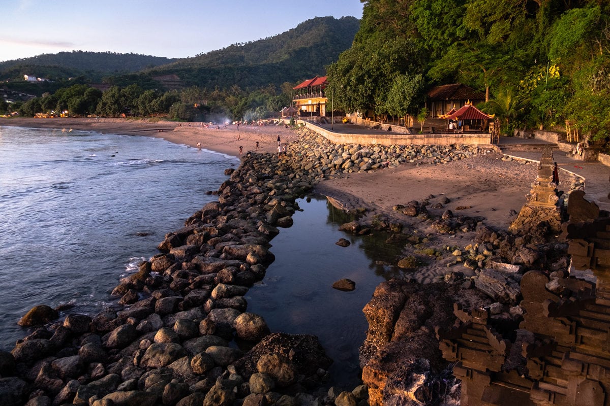South of Senggigi beach at Pura Batu Bolong, a small Hindu temple built on a rock with a big hole.