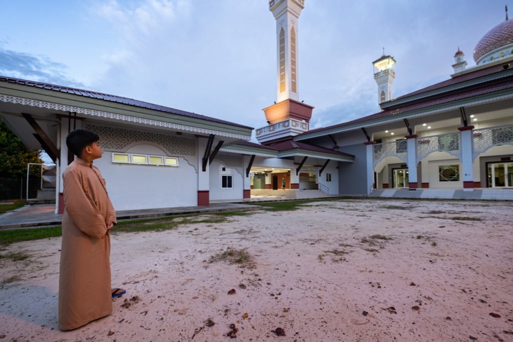 Young follower of Islam at KG Madang Mosque, Brunei.