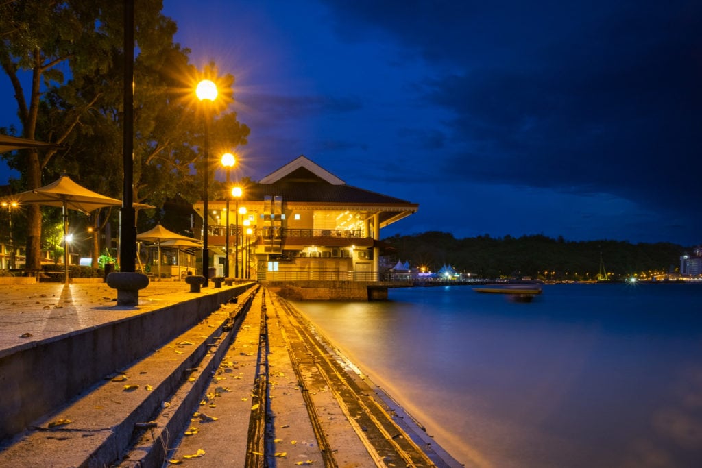 Evening shot of the pier at the waterfront of Bandar Seri Begawan, Brunei. The Horizons Seafood Restaurant is in the background.