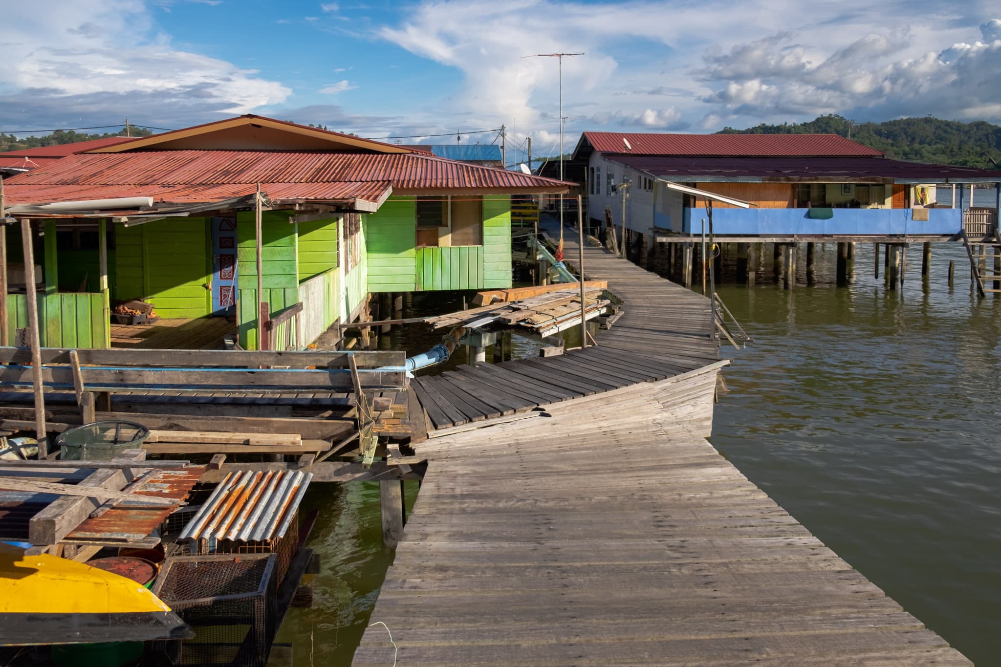 Traditional Bruneian stilt houses and wooden footpaths in Kampong Ayer (Water Village) on the Brunei River. Bandar Seri Begawan, Brunei.