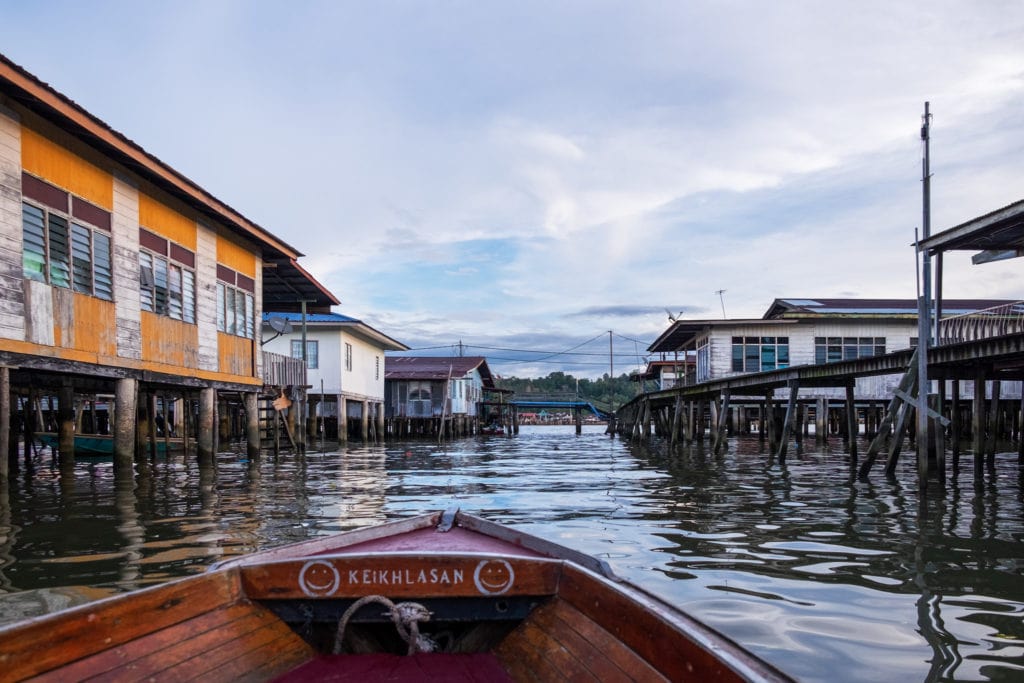 Cruising around Kampong Ayer, or the Water Village on the Brunei River. Bandar Seri Begawan, Brunei.