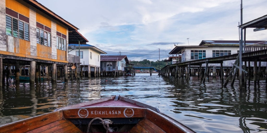 Cruising around Kampong Ayer or the Water Village on the Brunei River in Bandar Seri Begawan, Brunei.