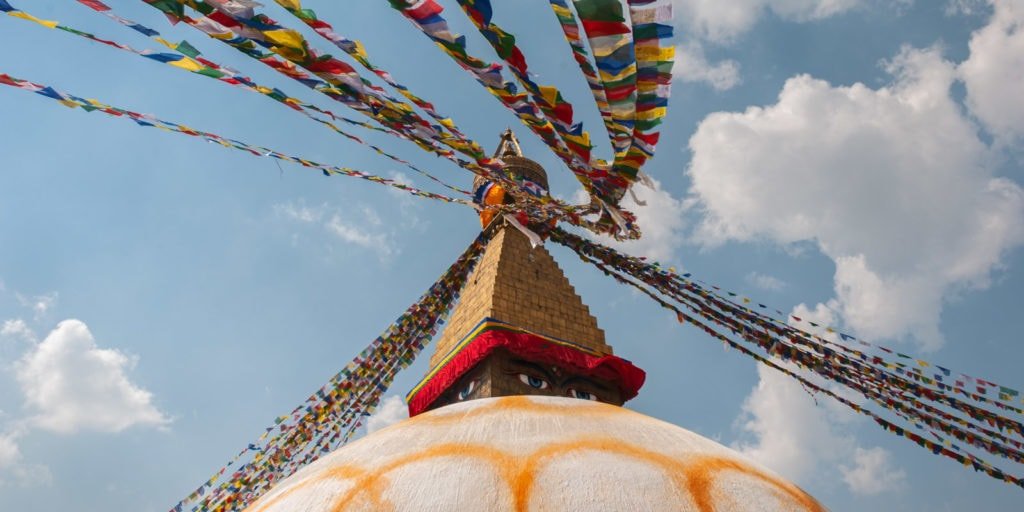 Travel photo of Nepal. Tibetan Prayer flags on Boudhanath Stupa. Kathmandu, Nepal.