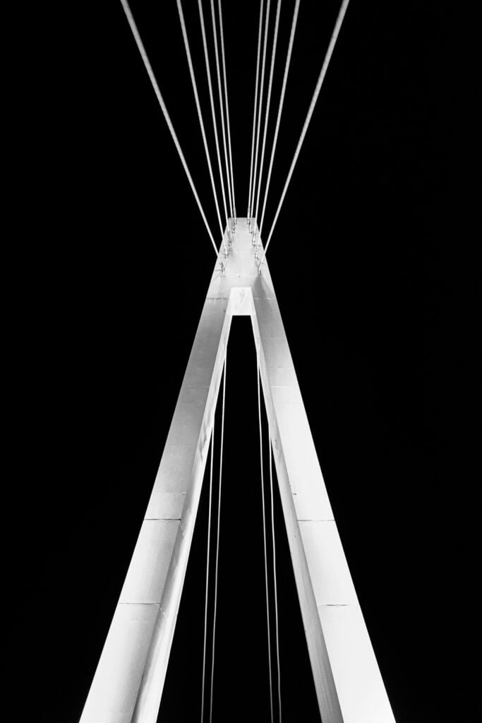 Black and White close up of the Tamsui Lovers' Bridge by night in Tamsui. New Taipei, Taiwan.
